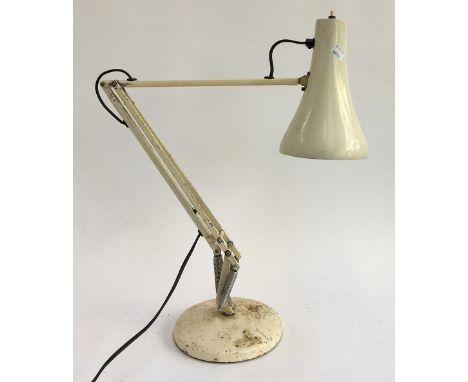 A white anglepoise lamp 