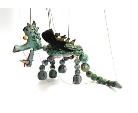 A Pelham Puppet 'Mother Dragon', wooden body with felt wings; together with 'Baby Dragon', wooden body with felt wings (2) 