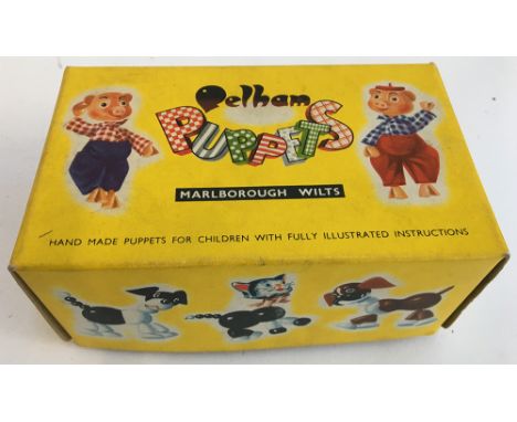 Two boxed vintage Pelham Dog puppets, with instructions (2) 