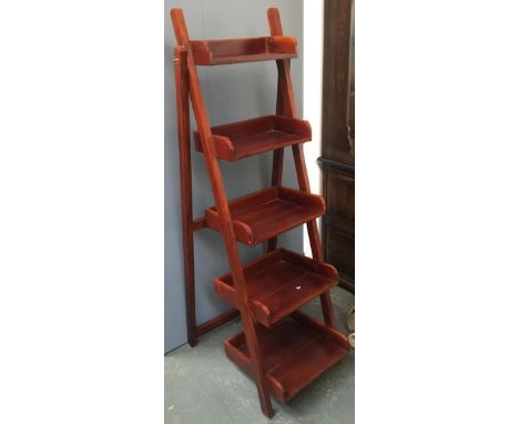 A five shelf folding hardwood stand 