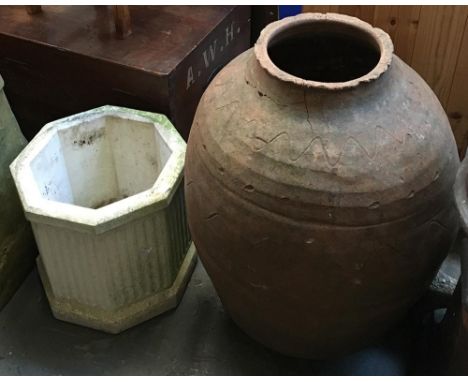 A composite stone planter together with a large terracotta urn (af), 65cmH 