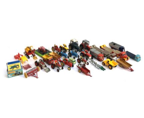 A large quantity of model tractors and other vehicles, to include Dinky and Britains, including a Matchbox 46 Ford Tractor &a