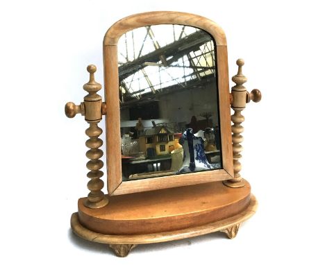 A pine dressing table mirror on bobbin turned supports 