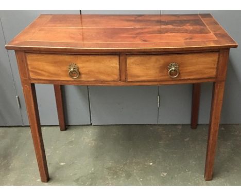 A 19th century light mahogany bow front side table, with light wood and checkered stringing, on square tapered legs, 91cmW; t