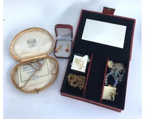 Boxed set of Omar pearls,pair of cuff-links in a first Avenue box together with a red floral jewellery box containing various