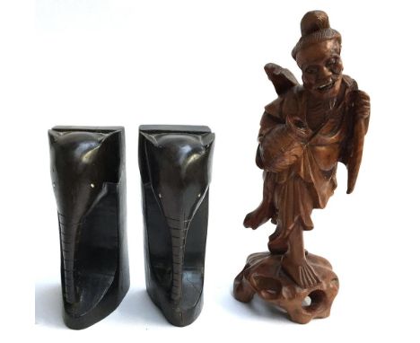 A pair of Vintage Lignum Vitae Elephant Bookends, together with a wooden carving of a Chinese old man with basket and stick 