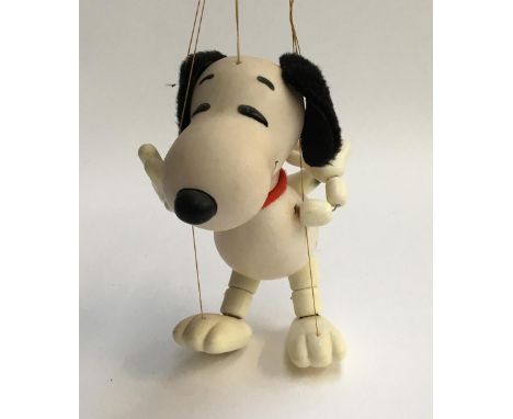 A Pelham Puppet Snoopy, plastic body with felt ears and collar; together with a Pelham Puppet Orinoco Womble, with fabric bod
