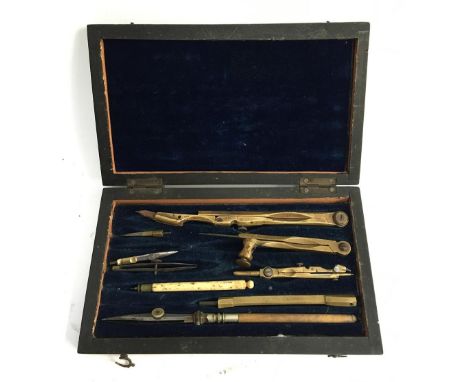 A mid-19th century brass and ivory geometry set in fitted rosewood case with blue velvet interior and inscribed brass plaque 