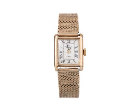 ROTARY NINE CARAT GOLD QUARTZ WRIST WATCH the rectangular dial with Roman hour markers, 17mm case, on a nine carat gold brace