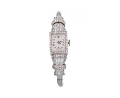 CERTIFICATED DIAMOND SET MANUAL WIND WRIST WATCH the rectangular dial with Arabic hour markers, diamond set 14mm case totalli