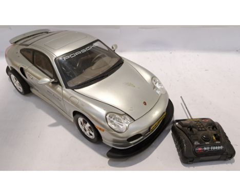 New Bright, a unboxed R/C 1:6 Scale Porsche 911 Turbo. Although unchecked for completeness or if in working order condition a