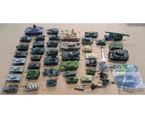 Dinky, Corgi, Solido, Airfix and similar an unboxed military vehicle group comprised of mainly tanks. Conditions appear Fair 