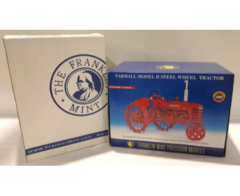The Franklin Mint, a boxed 1:12 Scale 1939 International Harvester Farmall Model 'H' Steel Wheeled Tractor. Although unchecke