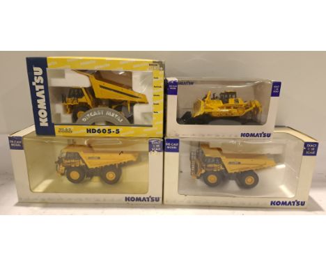 Komatsu, a boxed Group of 1:50 Scale Construction Vehicles. Includes D155AX-7, HD605 with others. Although unchecked for comp