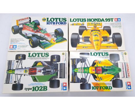 Tamiya, a boxed group of 1:20 scale plastic kits comprising of Lotus Formula 1 Racing Cars to include 20038 Lotus 107B Ford, 