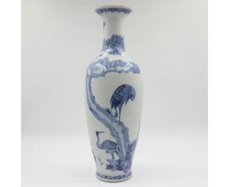 Kangxi style vase, the body decorated with cranes perching and in flight, lotus decorated bands to the rim and foot, six-char