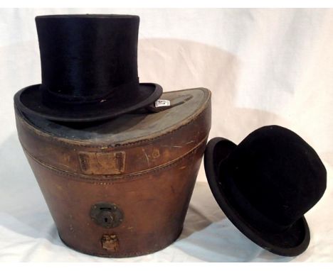 Dunn &amp; Co all black silk top hat in a period leather case (size 6 7/8). P&amp;P Group 2 (£18+VAT for the first lot and £3