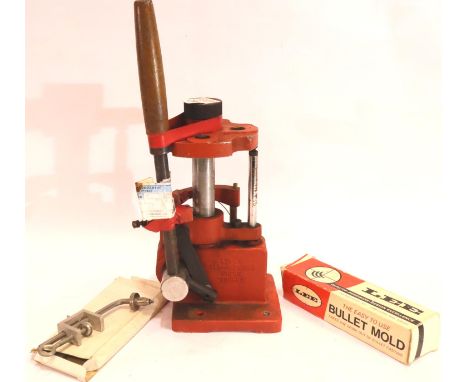 Boxed new old stock lead bullet mold and a Lyman target press. P&amp;P Group 3 (£25+VAT for the first lot and £5+VAT for subs