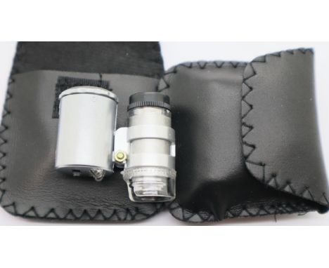Pair of currency/jewellery detecting loupes with LED light and leatherette pouch and instructions. P&amp;P Group 1 (£14+VAT f