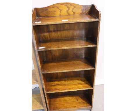 Two 1920s open oak bookcases, each of simple construction, largest 61 x 19 x 126 cm H, smaller 109 x 46 x 18 cm. Not availabl