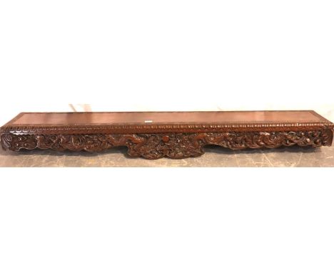 A 19th century carved Chinese mantel, having dragon and floral detail, 175 x 30 cm. Not available for in-house P&amp;P, conta