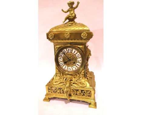 A 19th century French ormolu and lacquered brass 8 day table clock, chiming on a gong, circa 1870, H: 49 cm. Not available fo