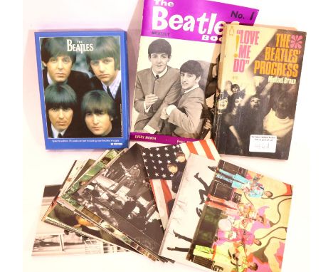 The Beatles 24 postcard set, Beatles Book issue 1 August 1963 and a paperback Love Me Do. P&amp;P Group 2 (£18+VAT for the fi