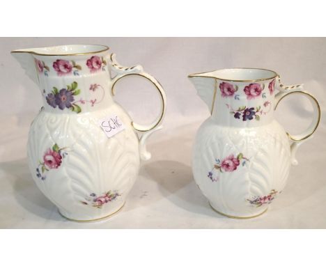 Two graduated Caughley mask head jugs, largest H: 21 cm. P&P Group 2 (£18+VAT for the first lot and £3+VAT for subsequent lot