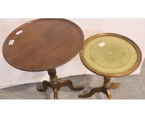 Mahogany circular lamp table on tripod supports and a further leather top example. Not available for in-house P&amp;P, contac