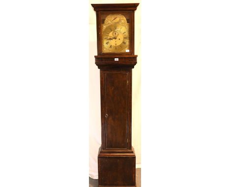 Oak cased brass faced long case clock, with brass dial and chiming on a gong, subsidiary seconds dial and date aperture, in w