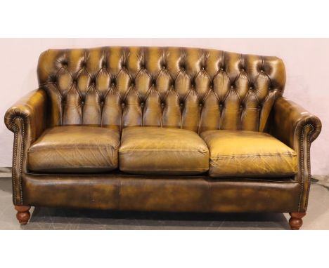 Brown leather buttoned back Chesterfield style sofa on tulip feet, 185 x 75 cm. Not available for in-house P&amp;P, contact P