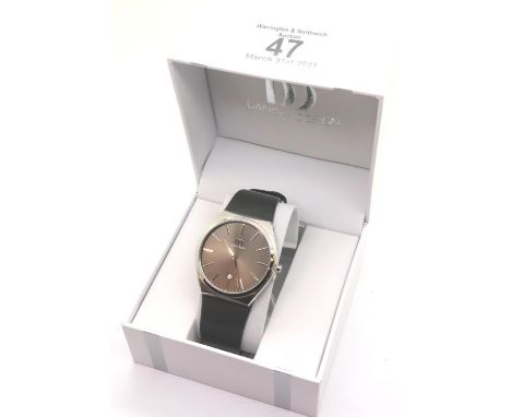 Gents Danish design calendar wristwatch, new and boxed. Working at lotting. P&amp;P Group 1 (£14+VAT for the first lot and £1