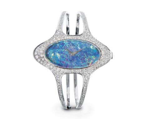 Kurz Opal-Brillant-Armbanduhr, 1970er Jahre750 Weissgold-Gehäuse Nr 075745, 46x23 mm. Handaufzugwerk. Ovales Opal-Zifferblatt