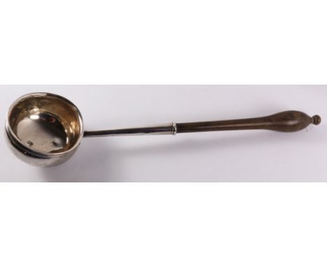 George II silver ladle with turned fruitwood handle probably by Edward Wood London 1743, 28cm Condition Report Click here for