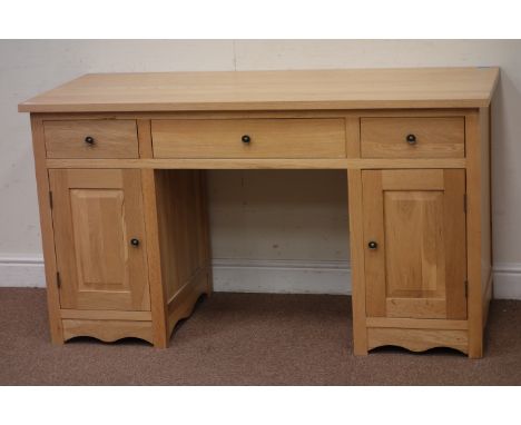 Light oak desk, three drawers, two cupboards, W141cm, H78cm, D61cm Condition Report Click here for further images, condition,