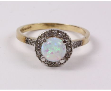 Opal halo cluster gold ring hallmarked 9ct Condition Report Click here for further images, condition, auction times & deliver