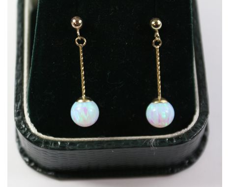 Pair of opal drop ear-rings stamped 375 Condition Report Click here for further images, condition, auction times &amp; delive