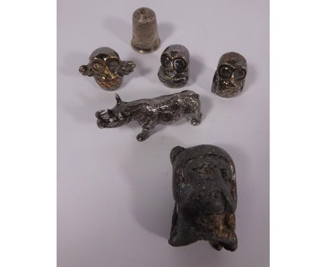 White metal rhino stamped 925, thimble, silver plated trinket and a Victorian lead head  Condition Report Click here for furt