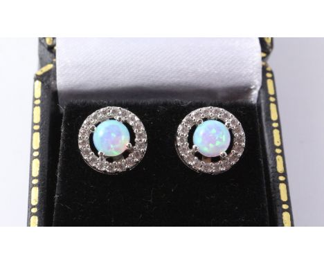 Pair of opal halo cluster ear-rings stamped 925 Condition Report Click here for further images, condition, auction times & de