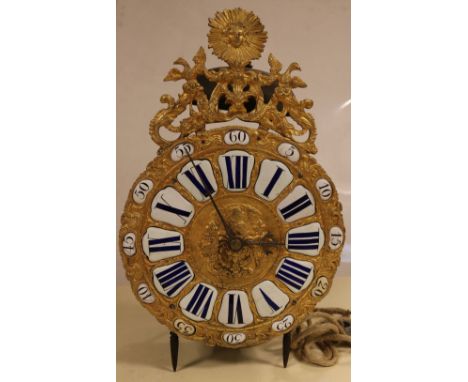 Large 18th century French lantern clock with gilt dial and enamel cartouches.Spindle and percussion.&nbsp;Dimensions: 44 x 26