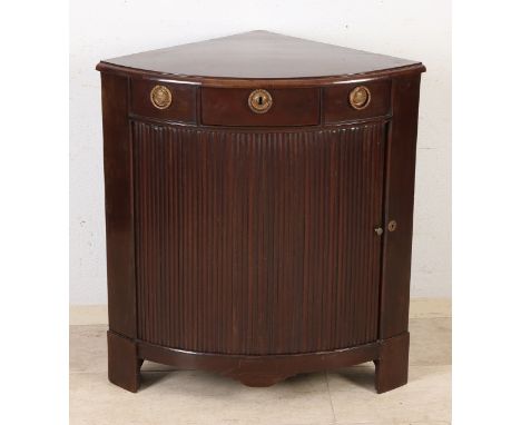 Dutch mahogany Louis Seize corner cabinet with roller door and drawer.&nbsp;With original gold-plated fittings.&nbsp;Circa 18