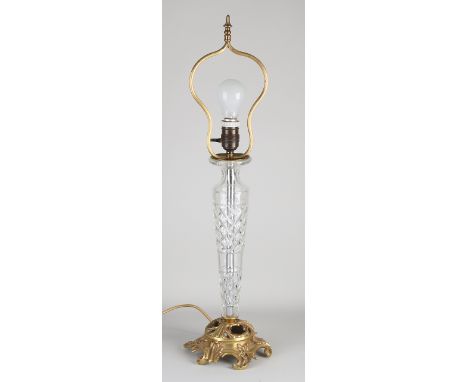 Large crystal glass lamp base with brass.&nbsp;20th century.&nbsp;Dimensions: H 71 cm.&nbsp;In good condition.