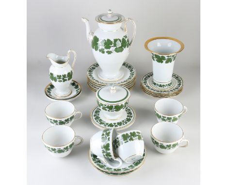 German porcelain Meissen partial service with Weinlaub decor.&nbsp;Second half of the 20th century.&nbsp;Consisting of: teapo