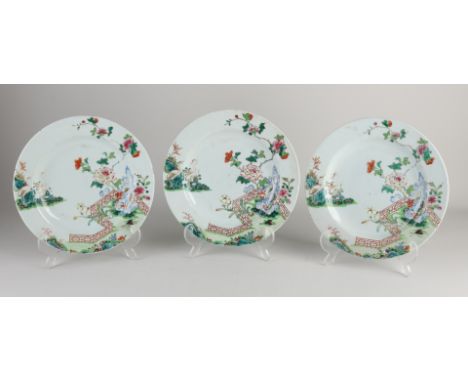 Three Chinese porcelain Familie Verte plates with garden/gold (enamel) decor.&nbsp;18th century.&nbsp;Hairlines + single chip