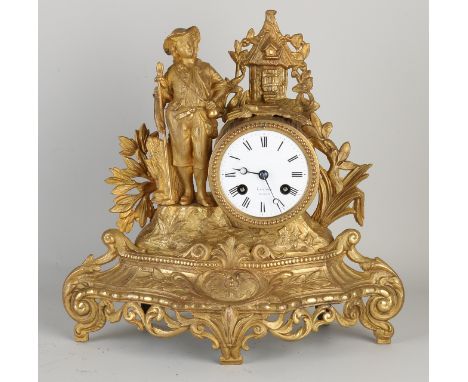 Antique gold plated French Louis Philippe romantic mantel clock.&nbsp;Eight-day movement, half-hourly strike, spring pendulum