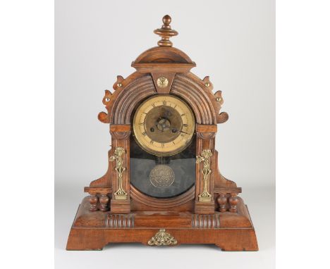 Antique American walnut table clock with alarm.&nbsp;Circa 1900. Dimensions: 51 x 44 x 16 cm.&nbsp;In good condition.
