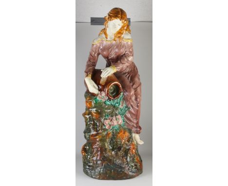 Large majolica statue.&nbsp;20th century.&nbsp;Woman with pitcher.&nbsp;One foot possibly restored.&nbsp;Dimensions: H 93 cm.