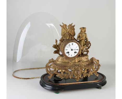 Antique French mantel clock with soldier, under glass dome.&nbsp;Circa 1860. Louis Philippe.&nbsp;Eight-day movement, half-ho