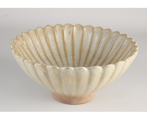 Large heavy Chinese porcelain celadon bowl with ribs.&nbsp;Equipped with light brown crackle glaze.&nbsp;Dimensions: H 12.5 x