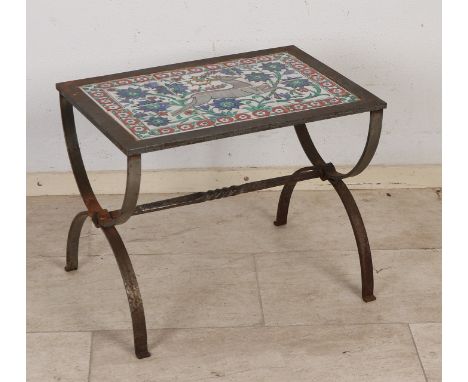 Antique wrought iron side table with six-pass Turkish Iznik tile tableau.&nbsp;One tile glued.&nbsp;Dimensions: 42 x 52 x 37 
